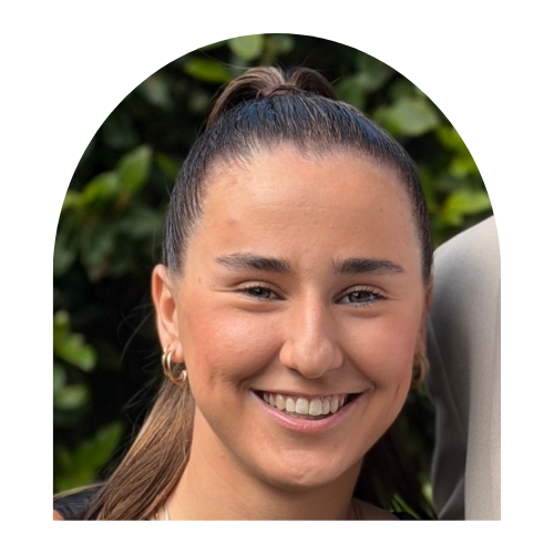 Photo of employee smiling at camera.